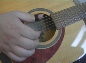 /images/guitarskole/tommelplektersnapshot.jpg
